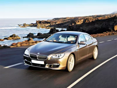 123oto THAY KÍNH XE Ô TÔ BMW 640i tận nơi